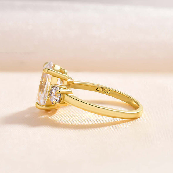 Golden Tone Oval Cut Three Stone Engagement Ring In Sterling Silver