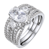 Oval Cut Three Stone Sterling Silver Bridal Set with Interweave Band