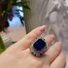 Vintage Halo Blue Gemstone Emerald Cut Engagement Ring