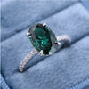 Classic Oval Cut Solitaire Emerald Green Engagement Ring In Sterling Silver