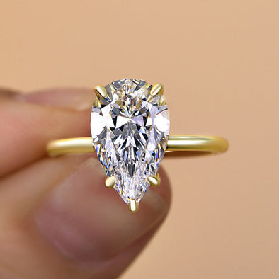 Classic Solitaire Pear Cut  Golden Tone Engagement Ring