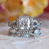 Halo Princess Cut Twist Bridal Ring Set in Sterling Silver