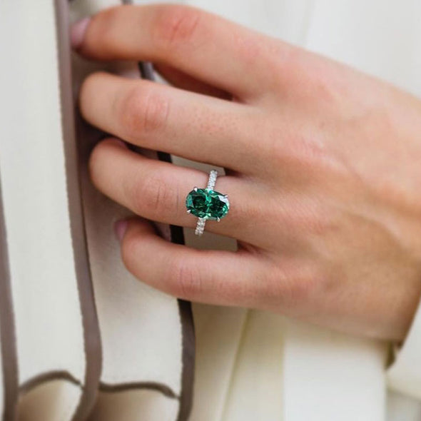 Classic Oval Cut Solitaire Emerald Green Engagement Ring In Sterling Silver
